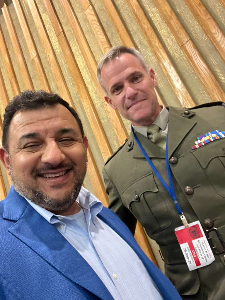 Humam Rajab with an international conference participant
